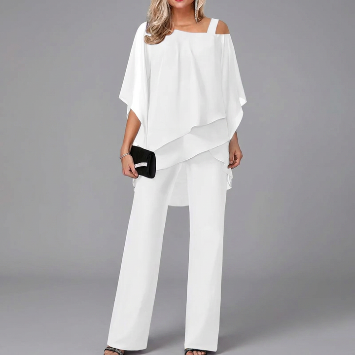 Elegante dames tweedelige set met comfortabele vleermuistop en bijpassende rechte broek, perfect voor casual chic.