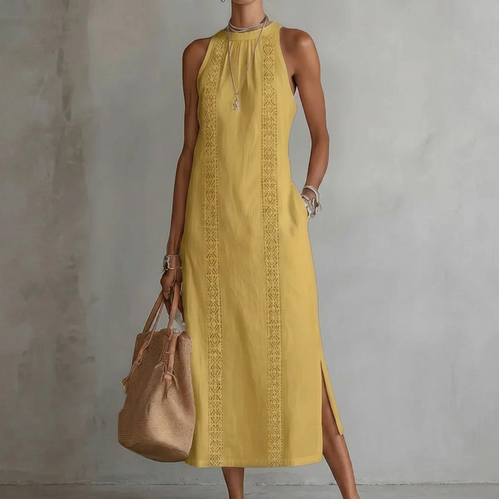 Comfortabele en elegante dames zomerjurk met halternek en prachtig kanten patchwork, ideaal als strandjurk.