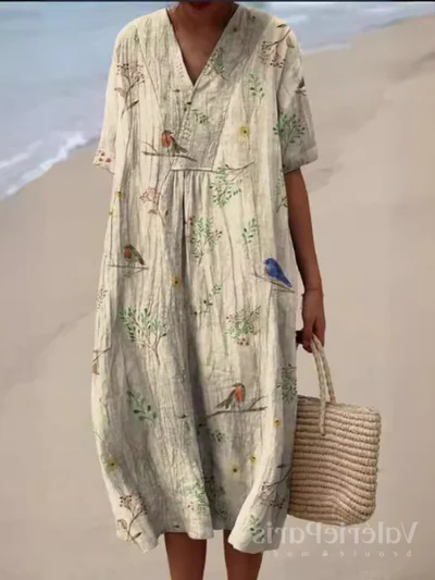 Dames zomerjurk, voorzien van een prachtig bloemenpatroon, comfortabel en modieus.