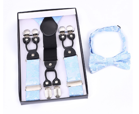 Stijlvolle heren vlinderdas met elegant patroon, onderdeel van complete accessoireset voor bruiloft of feest.