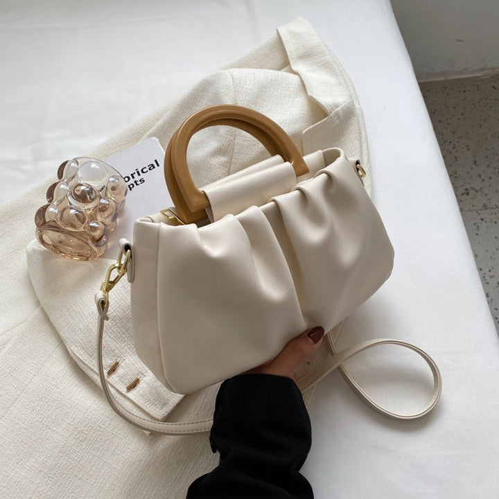 Veelzijdige dames schoudertas met ruches, een trendy en elegante tas voor dagelijks gebruik of speciale momenten.