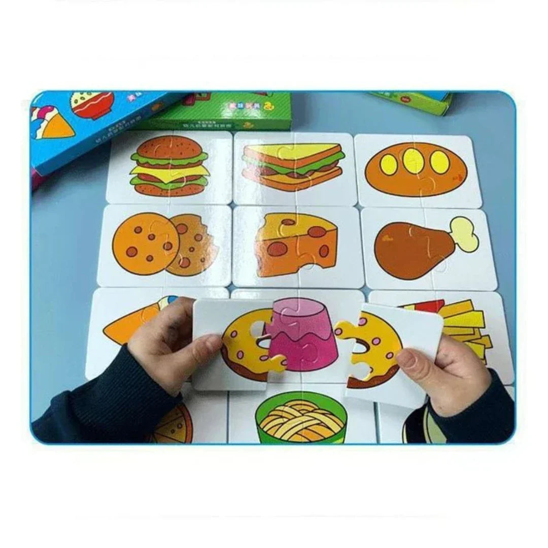 De verpakking van het kinder memospel, met nadruk op de 1+1 gratis actie en educatieve waarde.
