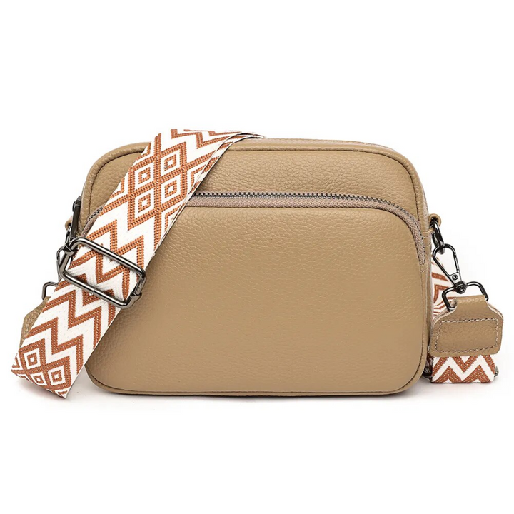 Stijlvolle dames handtas van echt leer, een veelzijdige messenger tas.