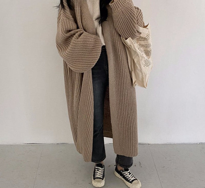 Comfortabel gebreid damesvest MollysVest met open voorkant, ideaal voor casual mode in lente of herfst.