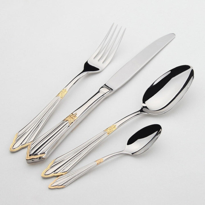 Luxe 24-delige RVS bestekset met gouden afwerking voor elegant dineren. Ideaal voor uw eetkamer.