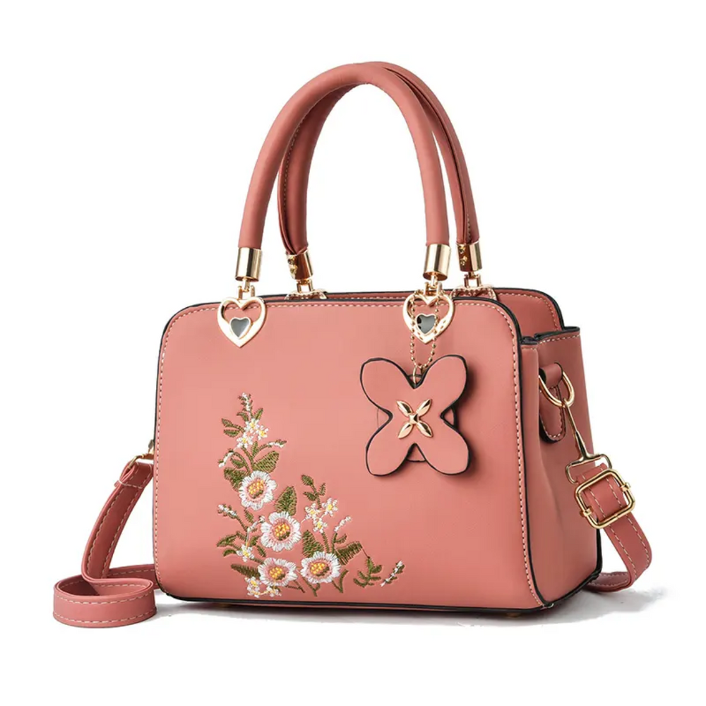 Elegante Flora dames crossbody tas, verfraaid met gedetailleerd bloemborduurwerk. Modieuze handtas.