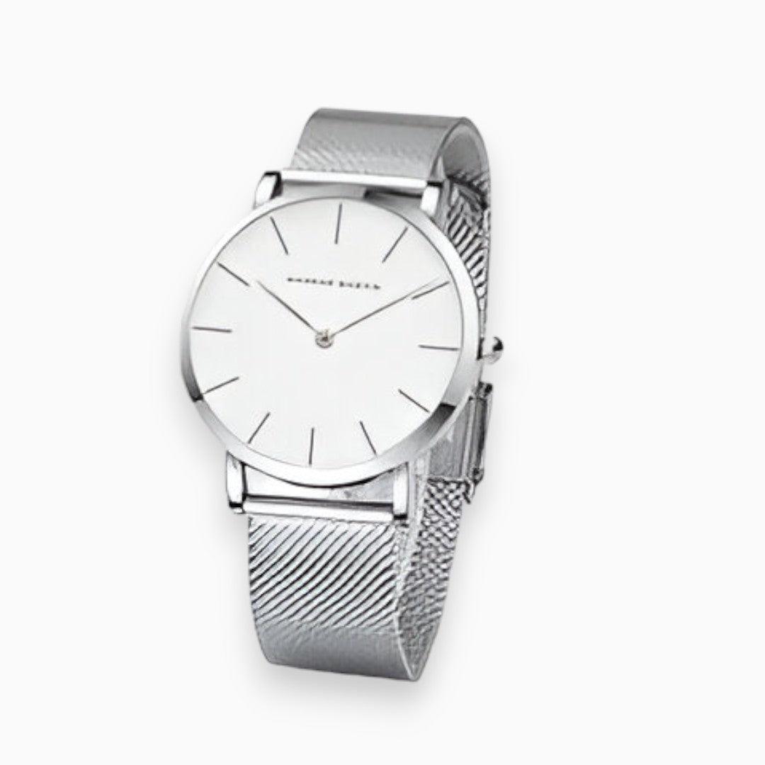 Goudkleurig Elara titanium chic horloge, waterbestendig en unisex. Modern stalen design accessoire voor elke outfit.