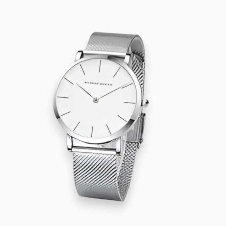 Goudkleurig Elara titanium chic horloge, waterbestendig en unisex. Modern stalen design accessoire voor elke outfit.