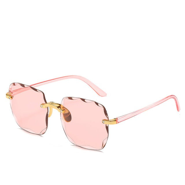 Elegante randloze dames zonnebril met vierkante glazen en UV400-bescherming. Trendy vintage zomer accessoire.