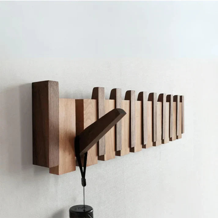 Houten wandkapstok met muzikaal design, ideaal voor hal en interieur opbergen.