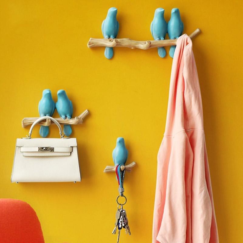 Decoratieve vogel wandkapstok. Unieke en speelse kapstok voor opbergen in je interieur.
