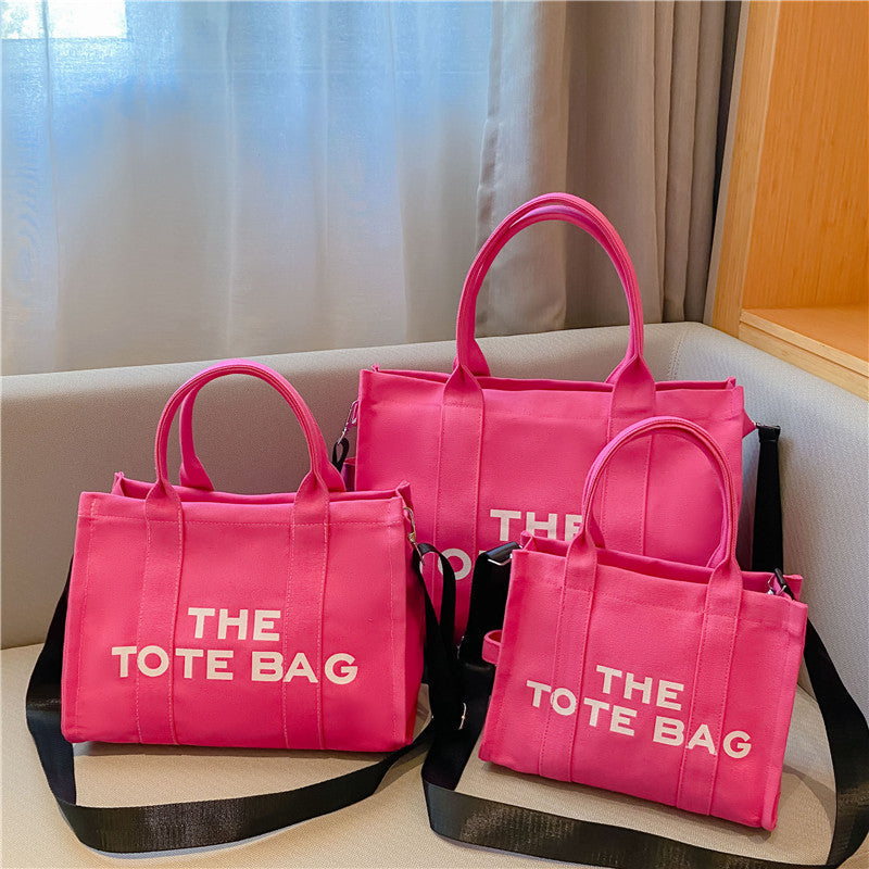 Moderne en stijlvolle canvas dames draagtas, functioneel als handtas of schoudertas, ideaal voor dagelijks gebruik.