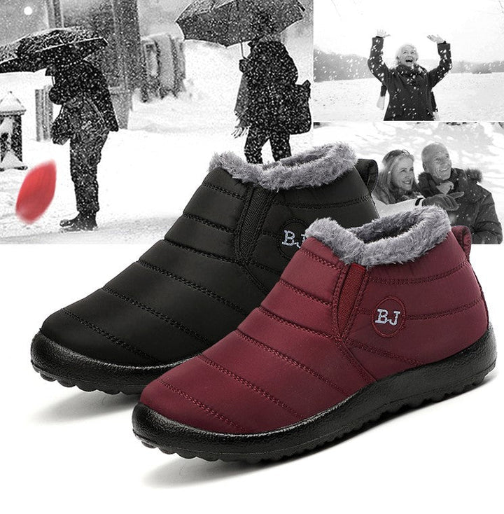 Rode dames winterlaarzen, waterdicht en warm met stevige antislipzool voor optimaal comfort.